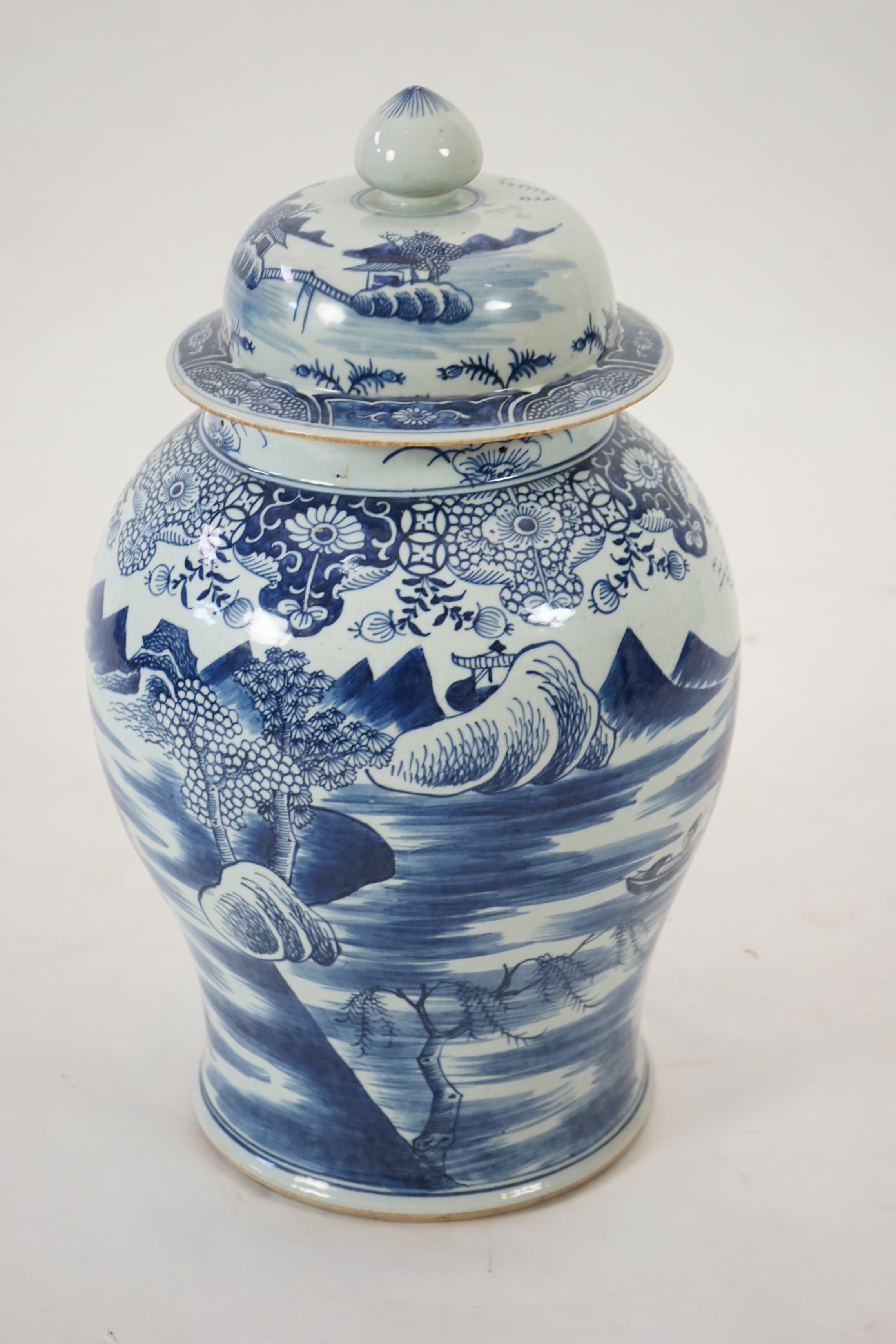 A massive Chinese blue and white ‘temple’ jar and cover, Qianlong period